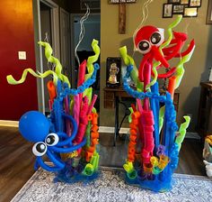 an octopus and squid balloon sculpture in the living room