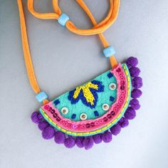 Multicolor Embroidered Bohemian Necklaces, Bohemian Multicolor Embroidered Beaded Necklaces, Multicolor Embroidered Bohemian Necklace, Multicolor Bohemian Embroidered Necklace, Multicolor Folk Style Festival Jewelry, Artisan Embroidered Necklaces For Festivals, Bohemian Handwork Jewelry As Gift, Bohemian Multicolor Handwork Jewelry, Bohemian Multicolor Macrame Necklaces