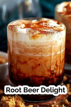 two glasses filled with root beer delight on top of a table