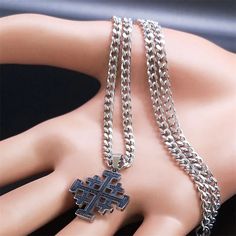 Elevate your style and express your allegiance to the Knights Templar with our Stainless Steel Jerusalem Cross Necklace. Meticulously crafted, this necklace features the iconic Jerusalem Cross design associated with the noble order. Wear it with pride, embodying the spirit of honor and chivalry that defines the Knights Templar. Make a bold statement with this thoughtfully designed necklace. Metals Type: Stainless Steel We ship worldwide to 185 countries! Please allow 1-2 business weeks for your Metal Clavicle Chain Necklace With Cross Pendant, Metal Chain Cross Necklace, Spiritual Metal Cross Necklaces, Symbolic Metal Clavicle Chain Jewelry, Stainless Steel Chain Necklace With Cross Pendant, Symbolic Metal Cross Necklace, Stainless Steel Cross Pendant Clavicle Necklace, Silver Spiritual Clavicle Chain Necklace, Spiritual Stainless Steel Clavicle Chain Necklace