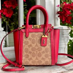 Coach 1941 Troupe Tote 16 In Signature Canvas And 1941 Red / Brass $425 ~Original Dust Bag Included Crafted Of Glovetanned Leather And Coach’s Signature Canvas, This Chic Design Is A More Petite Version Of The Original And Features A Structured Frame Top With An Open Interior. A Perfectly Secure Magnetic Bar Closure Is Finished With A New Twist On The Iconic Turnlock And The Detachable Shoulder Strap Lets You Be Hands-Free Whenever You Need To Be. Signature Coated Canvas And Glovetanned Leather Red Coated Canvas Top Handle Shoulder Bag, Red Top Handle Shoulder Bag In Coated Canvas, Luxury Red Satchel With Leather Handles, Red Luxury Satchel With Leather Handles, Red Coated Canvas Rectangular Bag, Red Rectangular Coated Canvas Bag, Red Coated Canvas Bag With Leather Handles, Red Coated Canvas Bag With Detachable Handle, Classic Red Coated Canvas Shoulder Bag