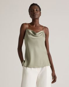 The neckline on this cami deserves a chef’s kiss. Softly draped to highlight your shape, it’s the ideal layer under a cardigan or blazer, or wear it on its own—a top this good deserves the spotlight. Adjustable straps ensure the right fit, and side slits let it sit perfectly on your hips. Made of our bestselling premium mulberry silk with a hint of stretch, famously low-maintenance and washable. Plus, silk fiber contains 18 kinds of amino acids that make it amazing for skin nourishment, hypo-all V-neck Camisole For Spring Workwear, Classic Fitted Summer Camisole, Chic Fall Camisole Tank Top, Chic Camisole Tank Top For Fall, Chic Spring Layering Tank Top, Chic Spring Tank Top For Layering, Chic Fitted Cowl Neck Tank Top, Elegant Summer Tank Top For Workwear, Fitted Tops With Spaghetti Straps For Fall