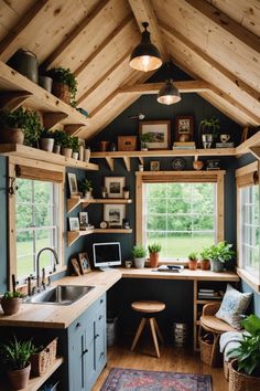 a kitchen with blue cabinets and wooden shelves filled with potted plants on the windowsill