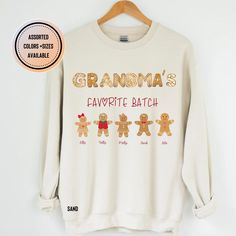 "Personalized Grandma Christmas Sweatshirt with Grandkids name, Grandmas Favorite Batch Sweatshirt,Gift For Grandma, Grandma Sweatshirt *SIZING: Please refer to size chart for appropriate sizing and compare measurements against your favorite shirt! HOW TO ORDER: 1. Select shirt size 2. Select shirt color 3.Click \"add to cart\" and then return to the listing if you want to order for other family members. 4.Click \"Proceed to check out\" Care Instructions : ~ Machine wash cold, inside-out, gentle cycle, ~ Tumble dry low, or hang - dry for a longer life. ~ Do not iron directly. ~ Do not dry clean. *Please feel free to reach out if you are looking for any other color or type of shirt / sweatshirt." Grandma Christmas Shirts, Christmas Shirts For Grandma, Christmas Grandma Shirts, Grandma Crewneck, Grandma Sweatshirts With Grandkids Names, Grandmas Christmas, Personalized Grandma, Christmas Sweatshirts, Grandma Gifts