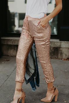 Sequined Tassel Trousers Spring Festival Sequin Bottoms, Trendy Tasseled Bottoms For Party, Trendy Party Bottoms With Tassels, Chic Tassel Pants For Spring, Fitted Bottoms With Tassels For Spring, Chic Bottoms With Tassels For Night Out, Spring Casual Pants With Tassels, Casual Spring Tassel Pants, Chic Festival Bottoms For Fall