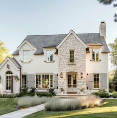 a large white house with lots of windows