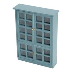 a blue cabinet with glass doors on the front