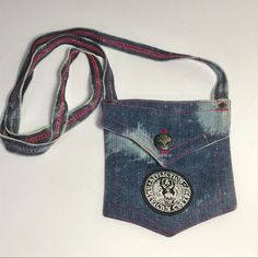 Repurposed Boho Denim Pocket Mini Crossbody Bag. Button Closure, Strap Drop Approx 24”, Custom Patches On Front And Back, Pink Top Stitching. This Cute Pocket Sized Pouch Is A Great Add For Your Festival Outfit! So Funky! Meas Approx 6” W X 6-1/2” H X 1/4” D. Condition: Excellent. Smoke Free And Pet Free Environment. Casual Cotton Shoulder Bag With Mobile Phone Pocket, Casual Upcycled Shoulder Bag, Casual Upcycled Recycled Denim Shoulder Bag, Casual Upcycled Crossbody Shoulder Bag, 70s Girl, Boho Denim, Hippie Love, Denim Pocket, Handcrafted Bags