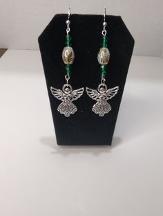 Angel Earrings with blue and silver accents Green Beaded Pierced Earrings, Angel Earrings, Green Accents, Silver Accents, Blue And Silver, Favorite Jewelry, Jewelry Earrings Dangle, Dangle Drop Earrings, Handmade Items