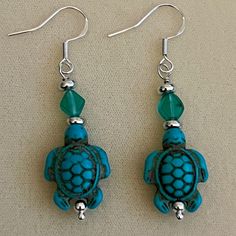 New Cute Turquoise Howlite Sea Turtle Earrings With 925 Silver French Wire Hooks. Earrings Are 3 Inches Long. Turquoise Jewelry With Matching Earrings For Beach, Hypoallergenic Turquoise Sterling Silver Jewelry, Turquoise Sterling Silver Earrings For Beach, Beaded Turtle Earrings, Wire Turtle Earrings, Nickel-free Turquoise Jewelry For The Beach, Turquoise Ocean-inspired Drop Earrings, Ocean-inspired Turquoise Drop Earrings, Whimsical Turquoise Nickel-free Earrings