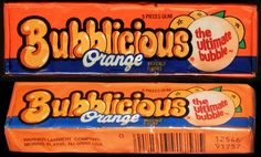 two boxes of bubblegum orange gum sitting side by side on top of each other