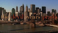 the devil wears prada in front of a cityscape with an orange text over it