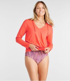 We designed this high-performance swim cover-up to offer plenty of coverage, comfort and style for a day of fun in the sun. This casual hooded top is ultra-versatile and perfect over your swimsuit at the beach or with shorts on the way home. Falls at hip. Relaxed Fit: Our most generous fit sits farthest from the body. UPF 50+ rated fabric blocks at least 97. 5% of the sun's UV rays - 10x more than a white cotton tee. Lightweight and breathable, the ultrasoft fabric dries quickly, wicks moisture Spring Beach Activewear With Stretch, Casual Tops With Uv Protection For Beach Season, Stretch Drawstring Tops For Beach, Casual Uv Protection Tops For Beach Season, Sporty Stretch Tops For Beach Season, Spring Stretch Activewear For Poolside, Upf 50+ Sports Swimwear For Spring, Sporty Long Sleeve Top For Summer, Athleisure Swimwear With Upf 50+ For Spring