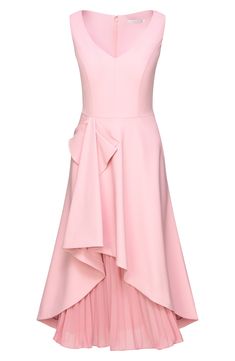 a pink dress with an asymmetrical skirt and pleaed heming on the bottom