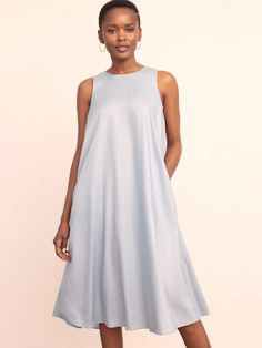 Meet your new floaty swing dress. Crafted in a wrinkle-resistant and super soft lightweight fabric, this midi can be dressed up with gold jewelry and wedges or down with sandals and a tote. | J.McLaughlin Women's Anita Dress Frost Blue, Size XS Chic A-line Maxi Dress For Daywear, Chic Silk A-line Sleeveless Dress, Elegant A-line Flowy Sleeveless Dress, Flowy Silk A-line Midi Dress, Versatile Midi Dress For Day Out, Summer Mid-length Maxi Dress For Evening, Mid-length Maxi Dress For Summer Evening, Chic Knee-length Sleeveless Silk Dress, Spring Silk A-line Midi Dress