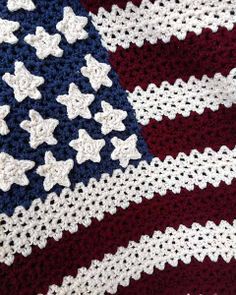 an american flag crocheted blanket with stars on it