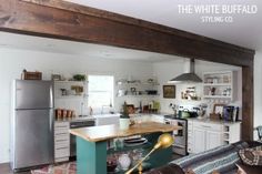 the kitchen is clean and ready to be used as a living room or dining area