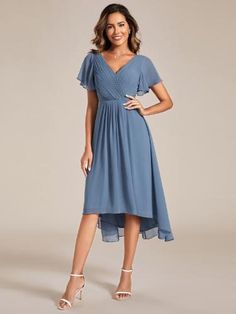 Perfect for a romantic garden wedding, this chic V neck high-low wedding guest dress is a delightful choice. The ruffled sleeves and pleated chiffon material add a touch of elegance, creating a whimsical look that's bound to impress. Pleated Chiffon Dress For Wedding, Summer Chiffon Bridesmaid Dress With Ruffles, Spring Bridesmaid Dress, Flowy Chiffon, Wedding Midi-length Chiffon Dress, Midi Length Chiffon Wedding Dress, Chiffon Midi Length Wedding Dress, Wedding Chiffon Midi Dress, Chiffon Midi Dress For Wedding, Elegant Asymmetrical Chiffon Dress For Spring