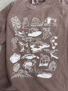 Our tribute to the nature in Texas! This design features national & state parks, major mountains, beloved lakes & rivers, & 15+ other beautiful sites from Palo Duro Canyon to Padre Island. Let it remind you of the places you've been and inspire you to see the rest! These will ship within 2 business days of ordering. If combined with a made-to-order item, we will default to shipping when your entire order is ready This listing has a measurement chart (please scroll through the photos); you can al Texas Nature, Michigan Nature, Cool Shirt Designs, Nature Tees, Park Designs, Beautiful Sites, South Dakota, West Virginia, You've Been