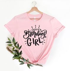 🎈 Happy birthday! Show up to your next birthday party in style with this eye-catching pink t-shirt that declares "Birthday Girl" for the lady of the hour! Or, a perfect gift for a friend for a night out on the town. This just might be the softest and most comfortable women's t-shirt you'll ever own. Combine the relaxed fit and smooth fabric of this tee with jeans to create an effortless every-day outfit with our birthday shirts, or dress it up with a jacket and dress pants for a business casual Pink Crew Neck Top For Birthday, Pink Letter Print Party Top, Pink Letter Print Top For Party, Pink Birthday Tops With Text Print, Pink Birthday Top With Text Print, Pink Tops With Text Print For Birthday, Pink Slogan Top For Birthday, Pink Letter Print Top For Birthday, Pink Birthday Top With Funny Print