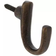 a close up of a metal hook on a white background with a screw in the middle