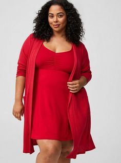 Matching Style(s): Search 42941376, 42941393 FIT Model is 5'10” wearing size 2. . Measures 44” from shoulder (size 2). . MATERIALS + CARE Super Soft Plush by Torrid™️ knit fabric: A warm, breathable fabric that’s extra cozy and comfy. Stretch level: Maximum. 48% rayon, 48% polyester, 4% spandex. Machine wash cold. Line dry. . Imported. DETAILS Long sleeves. Open neckline. Waist tie. . Pockets. . The best plus size women's super soft plush sleep robe robes in jester red made of supersoftplush. These comfy pajamas will be your favorite PJs to sleep in or lounge around. Torrid is your destination for cozy fall and winter clothes to keep you warm and comfortable. Comfy Pajamas, Plus Size Robes, Soft Robes, Lounge Robes, New Street Style, Pajamas Comfy, Active Outfits, Soft Cardigan, Matches Fashion