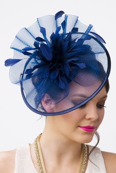 You are a picture of glamorous sophistication when you put on this romantic fascinator! Modern with a vintage touch, this elegant horse hair mesh base adorns a beautiful bouquet of soft feathers. A soft satin trim offers and allure that's simply breathtaking. - Horse hair mesh - Easy wear slip-on headband - Available in 4 colors Crinoline Hats, Crinoline Fascinator, Bride Hats, Navy Fascinator, Fascinator Hats Diy, Feather Bouquet, Green Fascinator, Fascinator Hair, Classy Hats