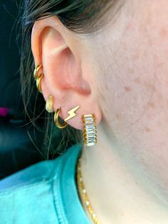 These tiny Huggies are perfect for a minimalist look, but add a little fun texture. 9 mm. They work in your lobe if you have smaller ears and they work very well in your cartilage or halfway up your ear! Great every day earring you don’t have to worry about. 100% US grade gold filled materials. Waterproof and tarnish resistant style. Tiny Trendy Cartilage Earrings, Trendy Huggie Ear Cuff For Everyday Wear, Trendy Small Hoop Single Ear Cuff, Dainty Small Hoop Ear Cuff For Everyday, Trendy Hypoallergenic Ear Cuff For Everyday Wear, Trendy Huggie Ear Cuff As A Gift, Trendy Huggie Ear Cuff Gift, Trendy Everyday Huggie Earrings With Ear Wire, Trendy Everyday Huggie Earrings