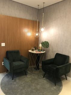 two chairs and a table in a room