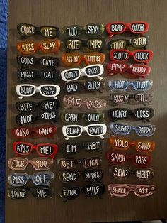 several magnets with words written on them in different colors and sizes, arranged to spell out the word