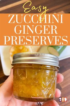 a hand holding a mason jar filled with homemade zucchini ginger preserves