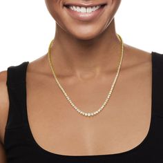 Ross-Simons - 3.00ct t. w. Diamond Tennis Necklace in 18kt Yellow Gold Over Sterling. 20". This 3.00 ct. t. w. round brilliant-cut diamond tennis necklace is a staple for the avid diamond lover. Dress it up or dress it down, this piece looks great on-duty or off. Shines in polished 18kt yellow gold over sterling silver. Graduates from 1/16" to 3/16" wide. Single-latch safety. Push-button clasp, diamond tennis necklace. Diamond birthstones are the perfect gift for April birthdays. Yellow Gold Brilliant Cut Tennis Necklace, Classic Gold Tennis Necklace With Brilliant Cut, Classic Gold Brilliant Cut Tennis Necklace, Gold Diamond Tennis Necklace For Anniversary, Gold Tennis Necklace With Prong Setting As Gift, Gold Dazzling Tennis Necklace With Brilliant Cut, Yellow Gold Single Strand Diamond Tennis Necklace, Gold Tennis Necklace With Single Cut Diamonds For Anniversary, Dazzling Diamond Cut Yellow Gold Tennis Necklace