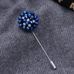 Material of Lapel Pin: Zinc Alloy Dimensions: 1.5” x 1.5” Color Stones: Copper with Clear Blue with Clear Black with Clear Silver with Clear Clear with Blue Large Safety Pin, Safety Pin Brooch, Diamond Crown, Color Stones, Vintage Suits, Cameo Brooch, Pearl Brooch, Men Vintage, Crystal Flower