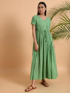 A free size long maxi dress with drawstring at the waist and double pockets Garment measurements (in Inches): Free Size: Bust: 50", Waist: 48", Length: 52" Fabric: Cotton Dobby Color: Green Fit: Model height is 5'7" Model is wearing a size S Loose and comfortable fit. Instructions: Hand wash separately in cold water Note: Available in other colors Pants not included with the product Pants can be bought separately This product will be shipped within 20-25 days of order placed. Pocket Maxi Dress, Green Fits, Colored Pants, Long Maxi, Best Deal, Long Maxi Dress, Model Height, Fabric Cotton, Free Size