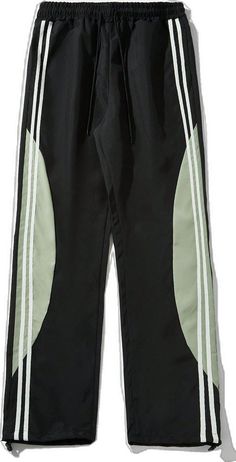 Green Streetwear Pants With Side Stripes, Green Pants With Side Stripes For Streetwear, Green Side Stripe Pants For Streetwear, Black Cotton Color Block Bottoms, Green Sweatpants With Side Stripes For Streetwear, Green Bottoms With Side Stripes For Streetwear, Sporty Black Patchwork Bottoms, Sporty Black Color Block Pants, Drawstring Waist Pants