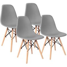 four grey chairs with wooden legs