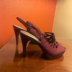 Brand New, Size 8.5 Us. Shoe Has 4" Heel And 1" Platform. Purple Suede Material On Top, Around Strap, And On Heel. Back Strap Stretches For Adjustability And Support. Burgundy Closed Toe Synthetic Heels, Burgundy Synthetic Heels For Party, Burgundy Synthetic Party Heels, Burgundy Synthetic High Heels, Navy Blue Pumps, Burgundy Heels, Cutout Heels, Jeweled Heels, Velvet Heels