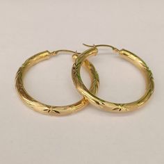 10kt Real Gold Hoop Earring Weight 3.63 Gram Round Size 39.2*39.2 Mm Thickness 4.2 Mm Please Check The Picture Carefully To See Size Of Earring 100%Authentic Gold Earring 14k Gold Stamped Hoop Jewelry, Gold Hoop Earrings Stamped 14k For Wedding, 14k Gold Hallmarked Hoop Jewelry, 14k Hoop Earrings For Anniversary, 14k Gold Hoop Jewelry For Anniversary, Gold Hoop Earrings Stamped 14k For Anniversary, Gold 14k Stamped Hoop Earrings For Anniversary, 14k Yellow Gold Round Hoop Earrings, Gold Plated Hoop Jewelry Stamped 14k