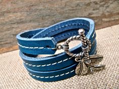 neat Leather Hand Wrapped Bracelet For Gift, Handmade Leather Wrap Bracelet Gift, Handmade Leather Wrap Bracelet For Gift, Casual Leather Strap Bracelets As Gift, Adjustable Blue Leather Bracelets, Adjustable Leather Wristlet As Gift, Adjustable Leather Wristlet For Gift, Blue Leather Bracelet For Gifts, Handmade Casual Leather Bracelets