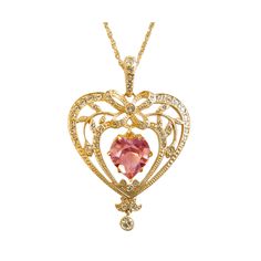 Gold Plated Crystal Birthstone Heart Necklace set with a heart shaped rose quartz Swarovski crystal.  Rose quartz is the birthstone for October.  Designed with opulence and premium appeal in mind, this exquisite women's necklace is sure to become a favourite of yours today, and a collectable family heirloom of the future. Featuring a delicate gold plated and sparkling crystal pendant frame, set with a statement heart shaped rose quartz Swarovski crystal and complete with a matching gold plated c Elegant Double Heart Necklaces For Jewelry Making, Heart Shaped Gemstone Necklace For Wedding, Heart Pendant Jewelry With Jewels For Wedding, Heart Pendant Jewelry For Wedding, Elegant Heart Necklace With Gemstone For Wedding, Elegant Heart-shaped Jewelry With Jewels, Elegant Heart Gemstone Necklace For Wedding, Elegant Heart Cut Necklaces For Jewelry Making, Heart-shaped Wedding Jewelry