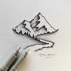 a drawing of a mountain with trees and mountains in the background, on top of a white paper