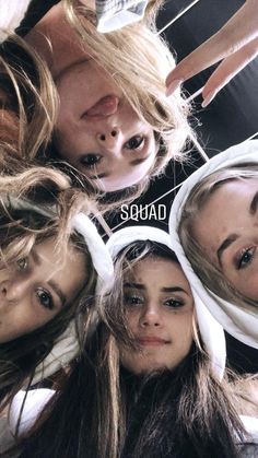 four girls with their heads wrapped around each other and the words squad written on them