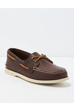 Full-grain leather upper/Rawhide laces/Rust-proof eyelets/Ortholite® cushioning for all-day comfort/Non-marking rubber outsole with signature Sperry Razor-Cut Wave-Siping™ technology/Not eligible for promotions | Only ships within the USA Classic Moc Toe Synthetic Sneakers, Classic Synthetic Moc Toe Sneakers, Classic Lace-up Boat Shoes With Textured Sole, Classic Brown Synthetic Leather Shoes, Classic Brown Faux Leather Shoes, Classic Boat Shoes With Branded Insole, Classic Boat Shoes With Ortholite Insole And Round Toe, Classic Leather Low-top Boat Shoes, Classic Brown Sneakers For Outdoor