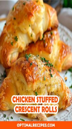 chicken stuffed crescent rolls on a plate with text overlay that reads, chicken stuffed crescent rolls