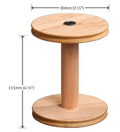 a wooden table with measurements for the base