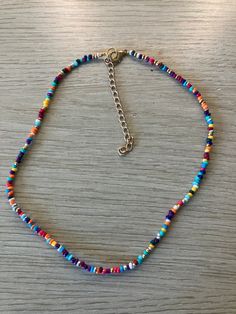 This is a super cute every day seed bead necklace to pair with any outfit! This has multiple different colors and includes extension chain for multiple sizes. Trendy Rainbow Beaded Necklaces, Trendy Rainbow Necklaces With Tiny Beads, Trendy Multicolor Heishi Beads Jewelry, Trendy Colorful Beaded Necklaces With Tiny Beads, Trendy Multicolor Beaded Necklaces With Heart Beads, Trendy Colorful Necklace With Tiny Beads, Colorful Trendy Beaded Necklaces With Tiny Beads, Colorful Heishi Bead Necklaces, Trendy Tiny Beads Necklace For Jewelry Making