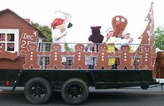 a truck is decorated with gingerbread men and women