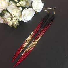 "These black red gold long fringe bead earrings pair amazingly with any outfit, dressy or casual. They are made of high-quality Czech colored beads with steel . Colors: black red gold Length: 7 inches (17.5 cm) Width: 0.5 inches (1 cm) Materials: Czech \"Preciosa\" beads Durable synthetic thread" Red Bead Earrings, Extra Long Earrings, Turquoise Bead Earrings, Beaded Jewelry Earrings, Ombre Earrings, Beaded Earrings Diy, Brick Stitch Earrings, Handmade Earrings Beaded, Beaded Earrings Patterns