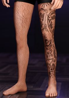 a man's legs with tattoos on them