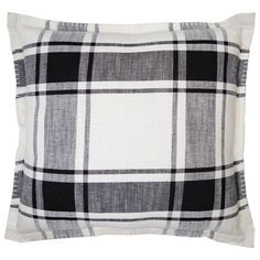 a black and white plaid pillow on a white background